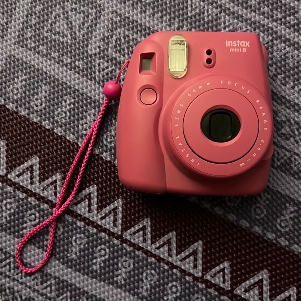 Pink polaroid camera